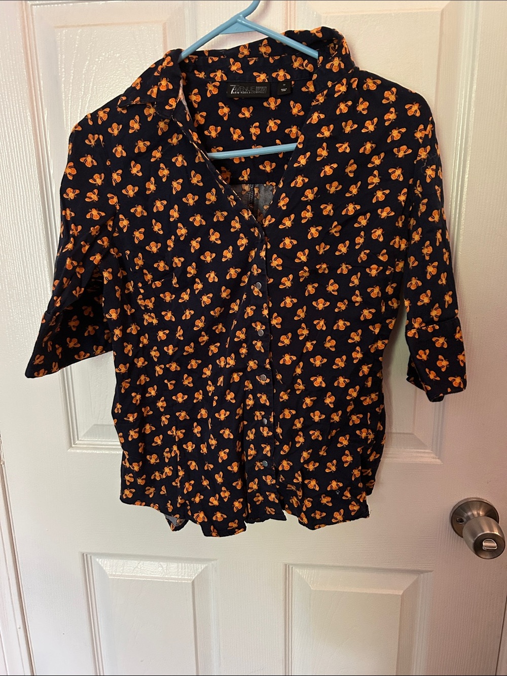 New York & Company Black Button-Up Shirt with Orange Floral Pattern
